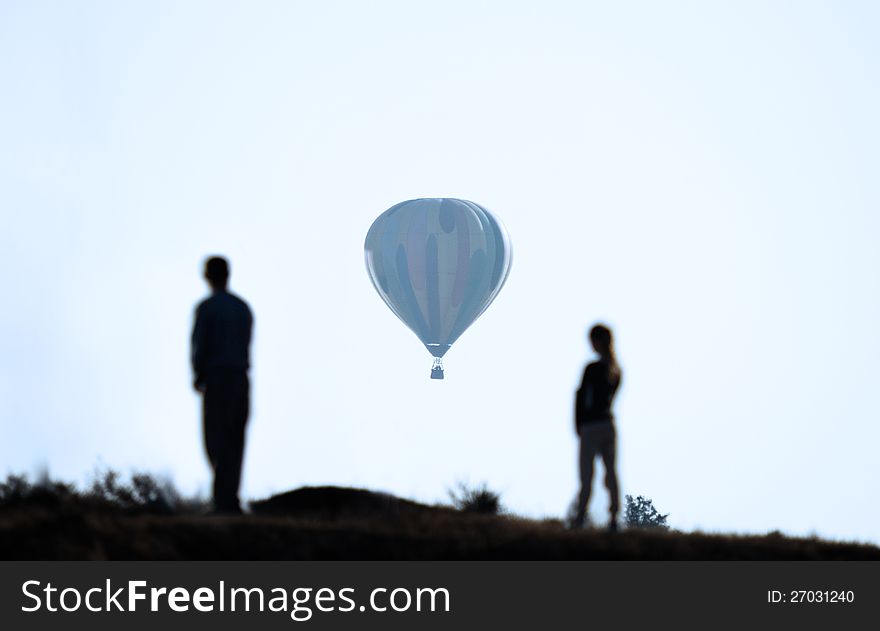 Balloon Flying Away In The Distance