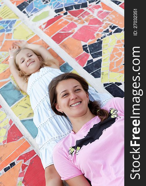 Portrait of happy mother and daughter on the walk