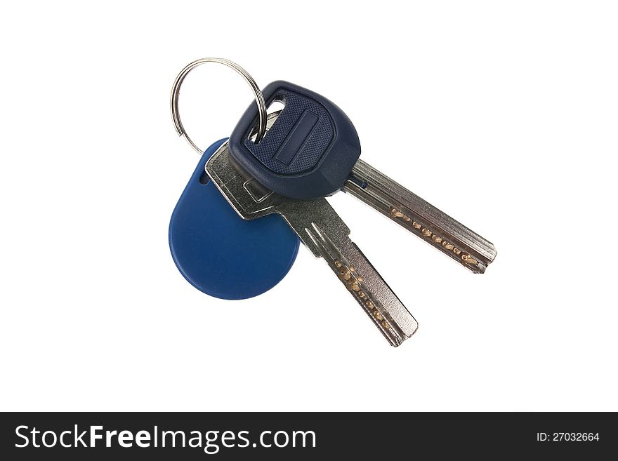 Two keys with remote controls from the front door area. Two keys with remote controls from the front door area