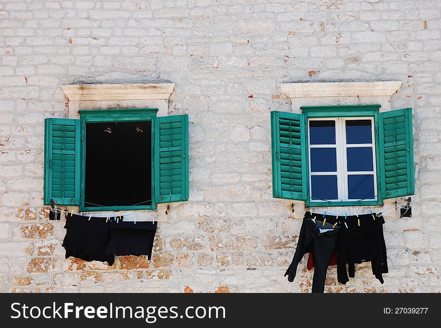 Windows with shutters in old Croatian building. Windows with shutters in old Croatian building