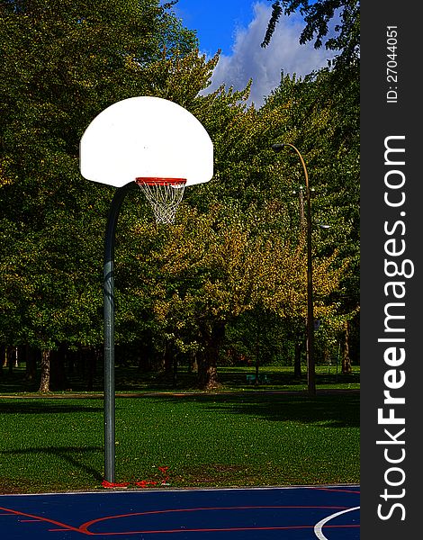 Part of an exterior basketball court