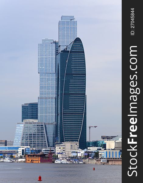 Construction of a modern high-rise business center on the banks of the Moscow River. Moscow, Russia. Construction of a modern high-rise business center on the banks of the Moscow River. Moscow, Russia.