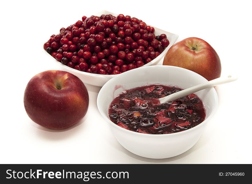 Red cranberries, apples and cranberry jam with apples. Red cranberries, apples and cranberry jam with apples.