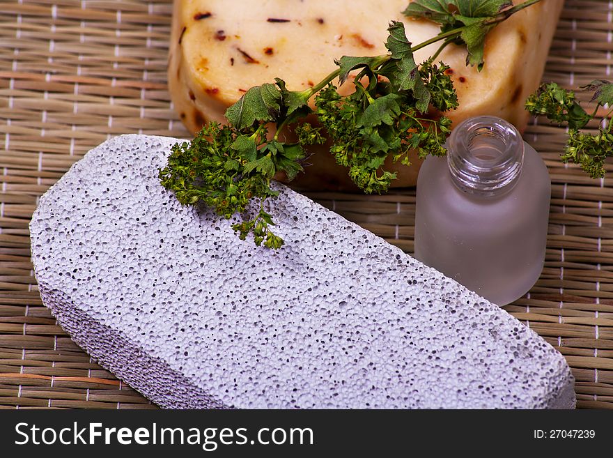 Pumice stone and handmade soap with herbs. Pumice stone and handmade soap with herbs