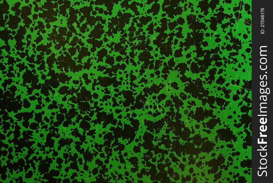 Black and green grunge scratched background.