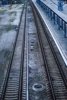 Empty Railway Station Platform. Blue Columns At The Train Station. Top View Of The Railway. Stock Image