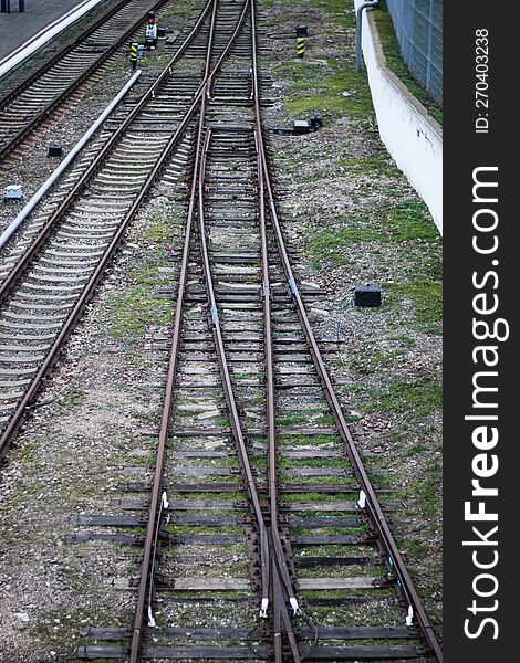 Top view of the branching railway. An empty rusty railway.