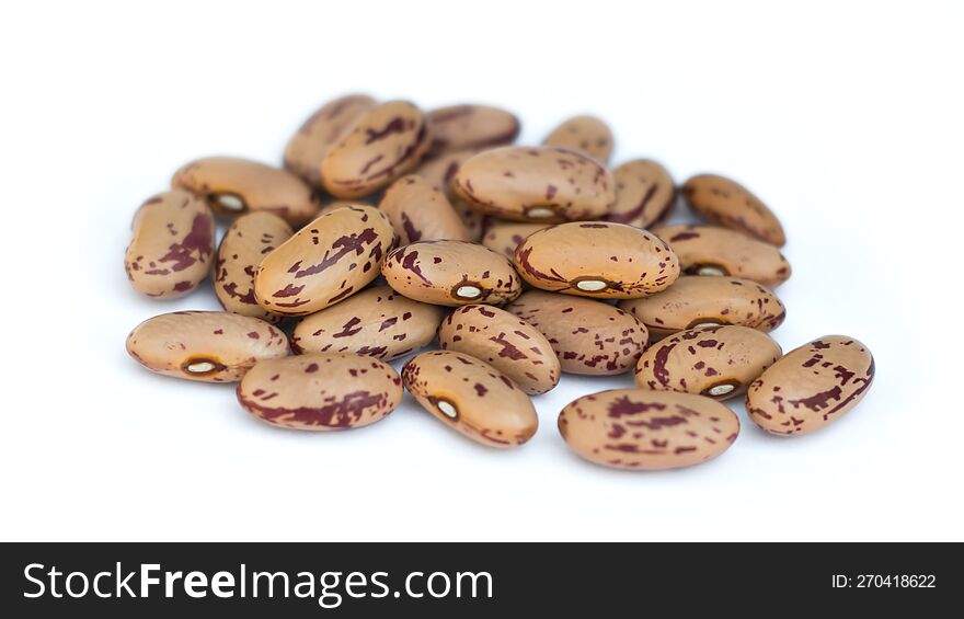 Pinto beans on white background. Close-up