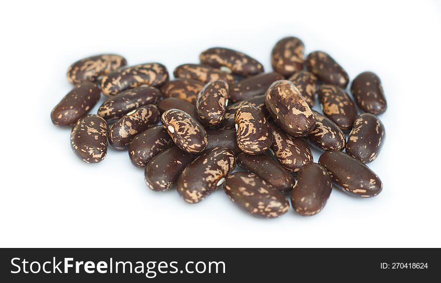 Dark Brown Beans On White Background. Close-up