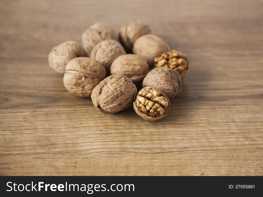 Walnuts On Brown Wood