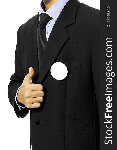 Man with black business suit with blank pinned button give thumb up. You can put your design on the button. Election day background or concept. Man with black business suit with blank pinned button give thumb up. You can put your design on the button. Election day background or concept