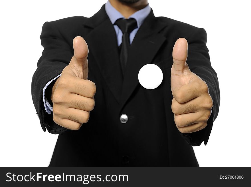 Man with black business suit with blank pinned button give thumb up. You can put your design on the button. Election day background or concept. Man with black business suit with blank pinned button give thumb up. You can put your design on the button. Election day background or concept