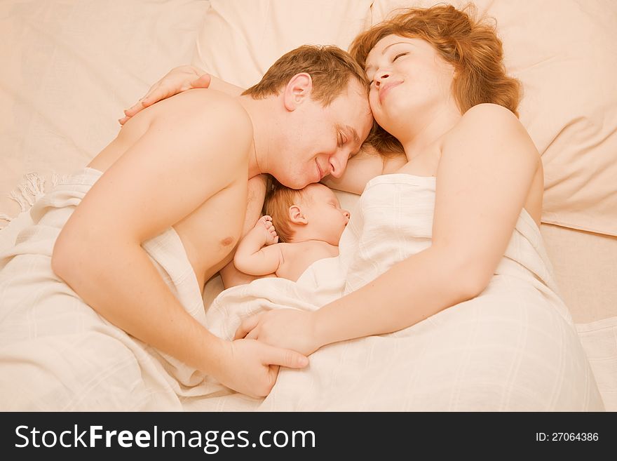 Nice family sleeping together