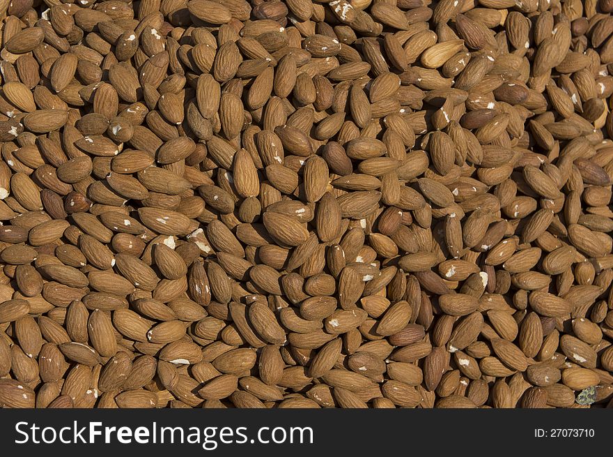 Pile of almonds closeup.