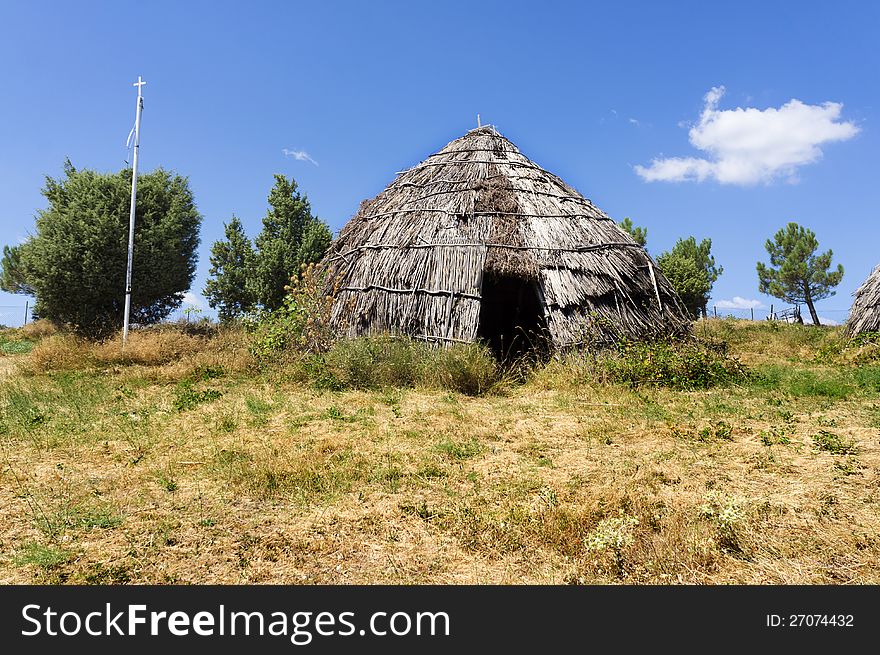 Traditional straw hut in greek country