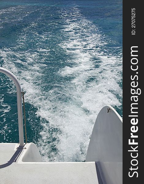 Image taken from the back of a motor boat. Image taken from the back of a motor boat
