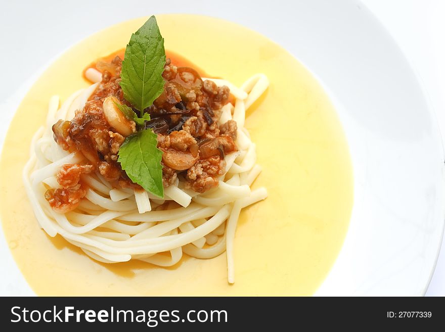 Spaghetti with tomato sauce on plate with white background. Spaghetti with tomato sauce on plate with white background