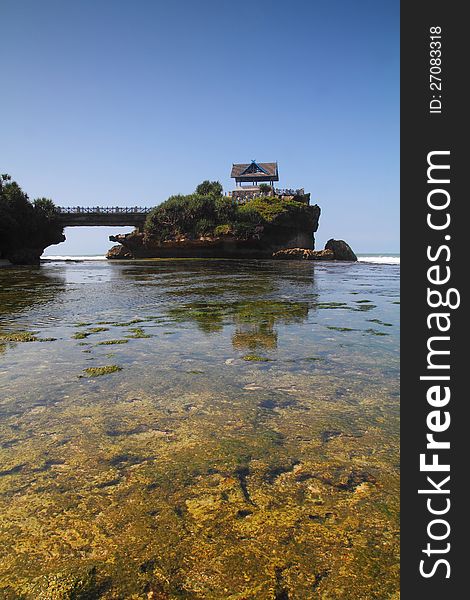 Beach scenery with Islet connected with a bridge. Beach scenery with Islet connected with a bridge