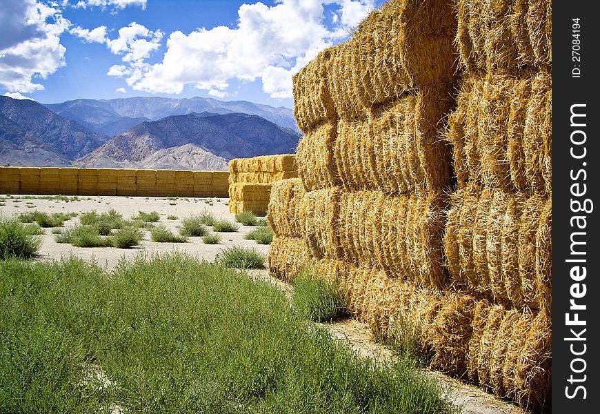 Sun lights up hay bales in high desert of California USA. Sun lights up hay bales in high desert of California USA