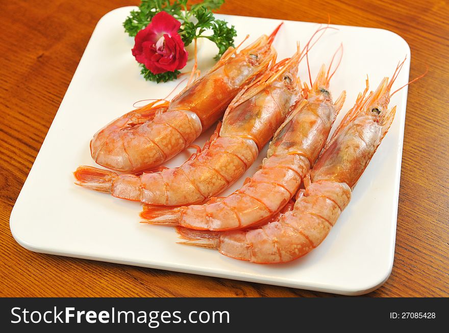 Barbecue; Grilled shrimp on a plate