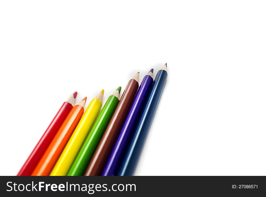 Colored wooden pencils isolated on white background. Colored wooden pencils isolated on white background