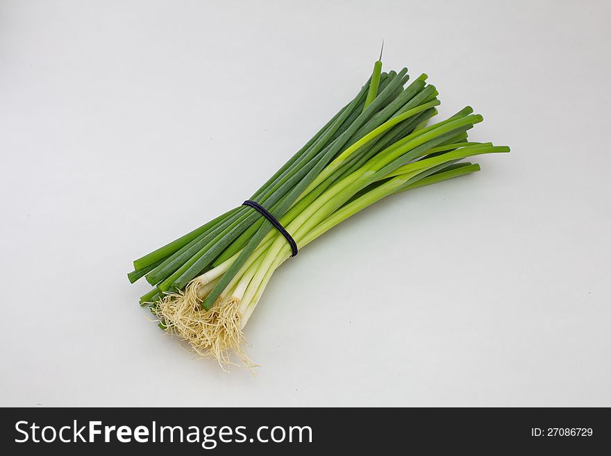 Bunch of spring onion on white background