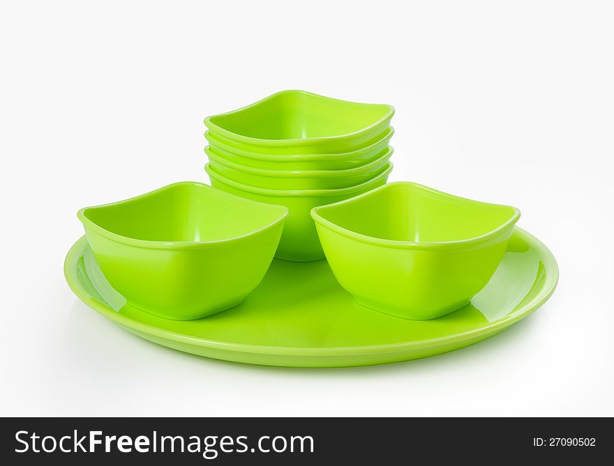 Close up of plastic microwave bowl and plate isolated over white. Close up of plastic microwave bowl and plate isolated over white