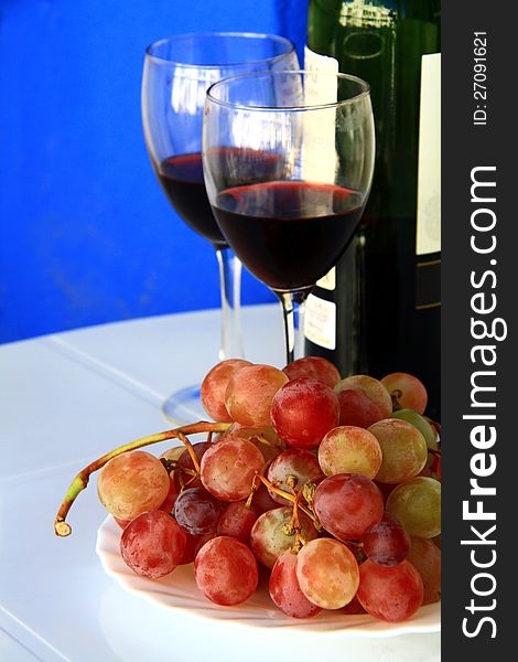 Image of two glasses on a new years day with grapes. Image of two glasses on a new years day with grapes