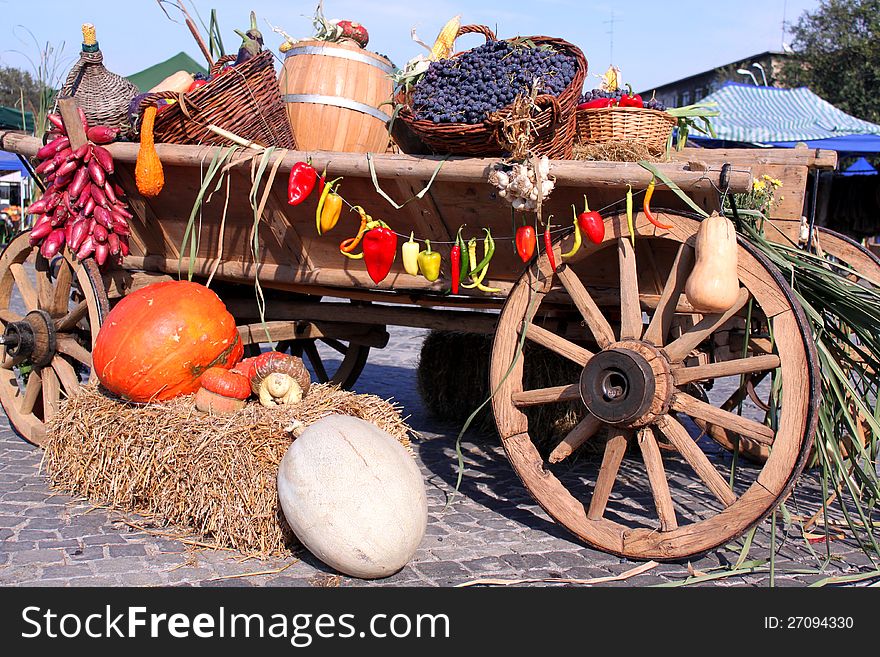 Autumn vegetables on the wooden wagon outdoor