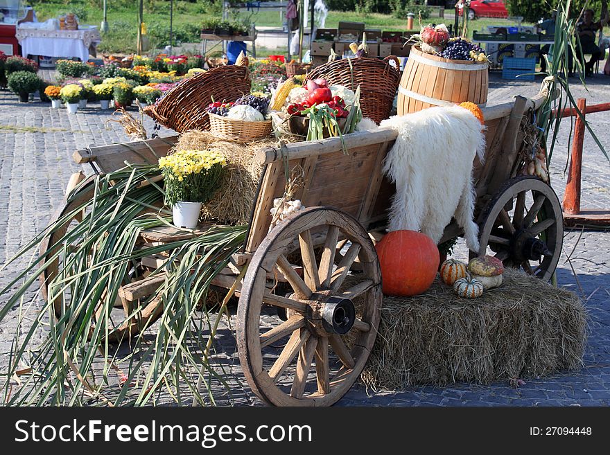 Wooden wagon with seasonal vegetables of autumn. Wooden wagon with seasonal vegetables of autumn