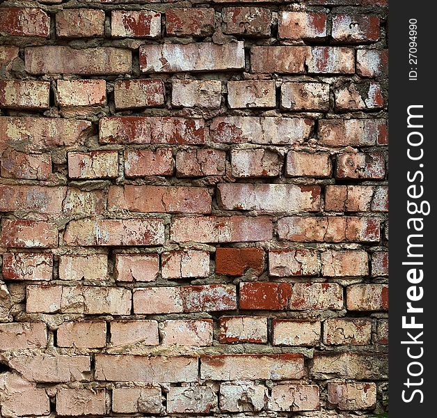 Aged red brick wall pattern. May be used as background or texture. Aged red brick wall pattern. May be used as background or texture