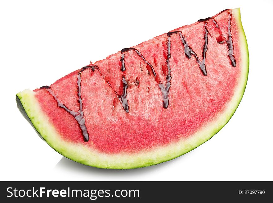 Watermelon and chocolate sliced close up on the white