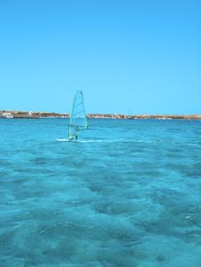 Windsurfer In Blue Sea Stock Photography