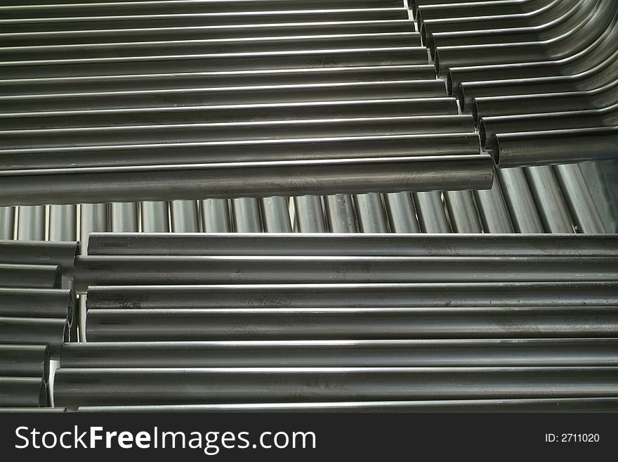 Parallel steel tubes in two layers. Industrial components. Parallel steel tubes in two layers. Industrial components.