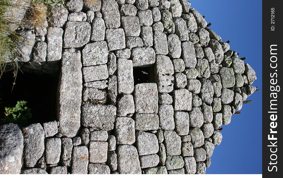 A rocky house lost in a hamlet in france