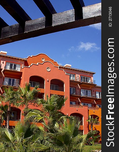Front view of a colonial hotel at the beach of Los Cabos, Baja California, Mexico, Latin America. Front view of a colonial hotel at the beach of Los Cabos, Baja California, Mexico, Latin America