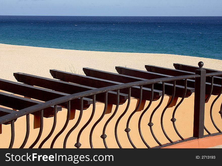 Lines formed by the balcony and wood, beach and sea at Los Cabos, Baja California, Mexico, Latin America. Lines formed by the balcony and wood, beach and sea at Los Cabos, Baja California, Mexico, Latin America