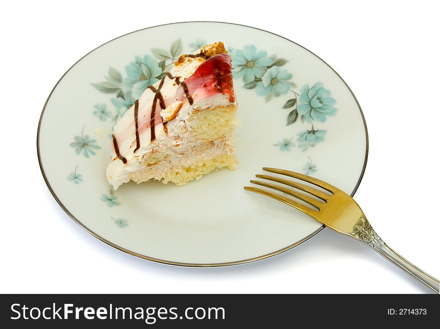 Cake on plate and fork, isolated on white background