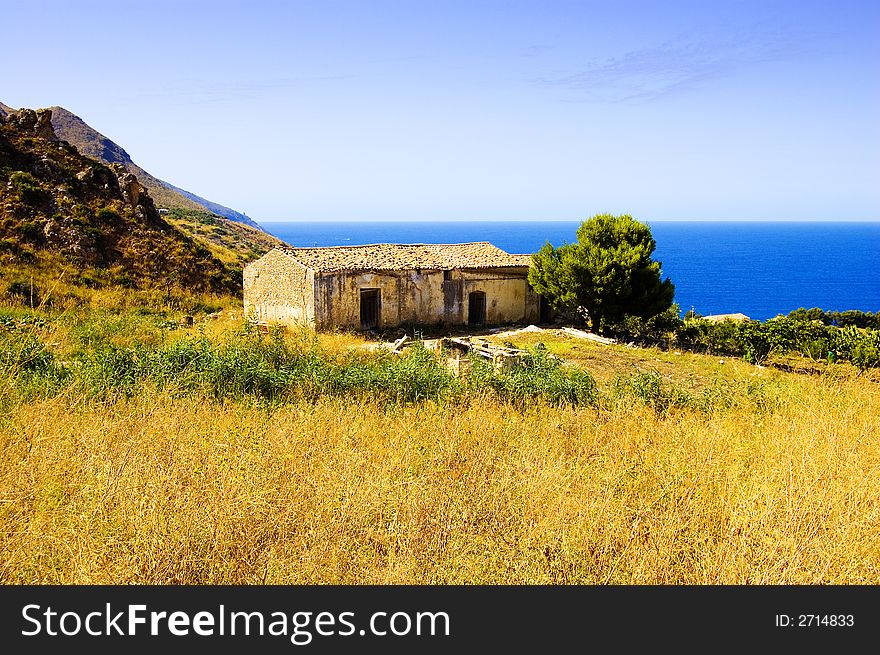 Old Italian house on a hillside in the summer