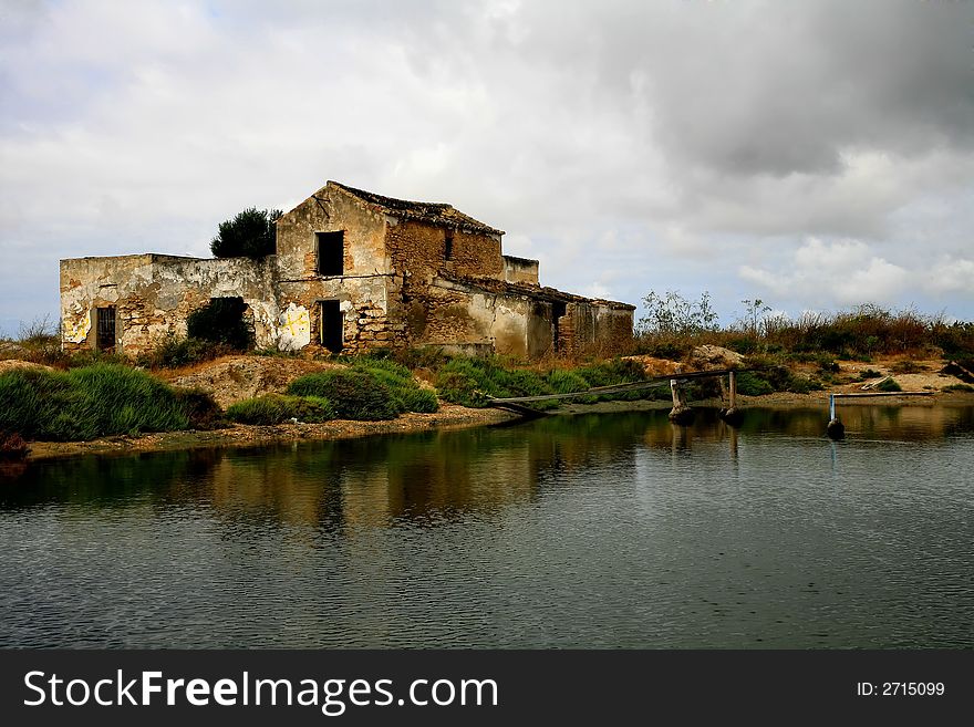 A old fisherman house near the small lake. A old fisherman house near the small lake