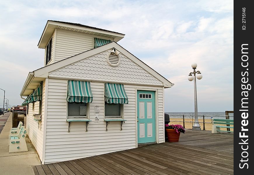 A colorful small building along the beach at Avon By the Sea along the Jersey shore. A colorful small building along the beach at Avon By the Sea along the Jersey shore.
