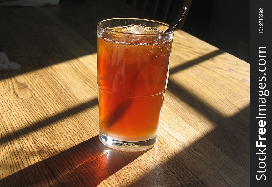 Iced tea in light of the sun