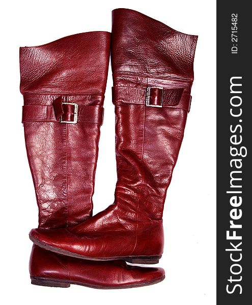 Red leather woman jackboot. Isolated white. Red leather woman jackboot. Isolated white.