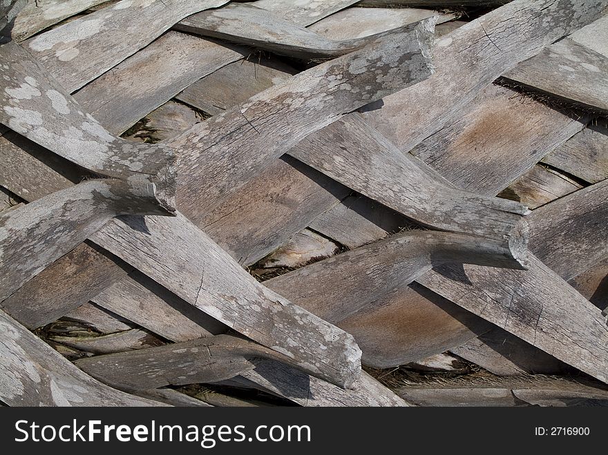 The criss-crossed pattern of a palm tree's bark for background use. The criss-crossed pattern of a palm tree's bark for background use.