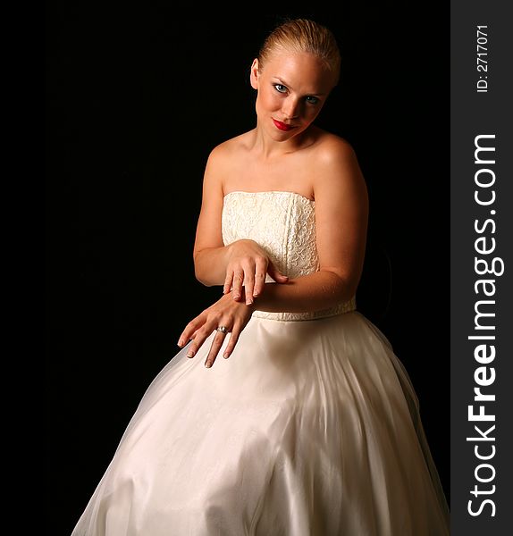 Beautiful Bride Against Dramatic Black Background