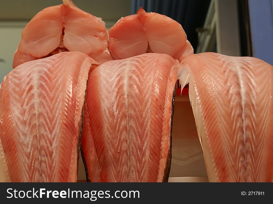 Sliced tasty fresh kingfish in the marketplace
