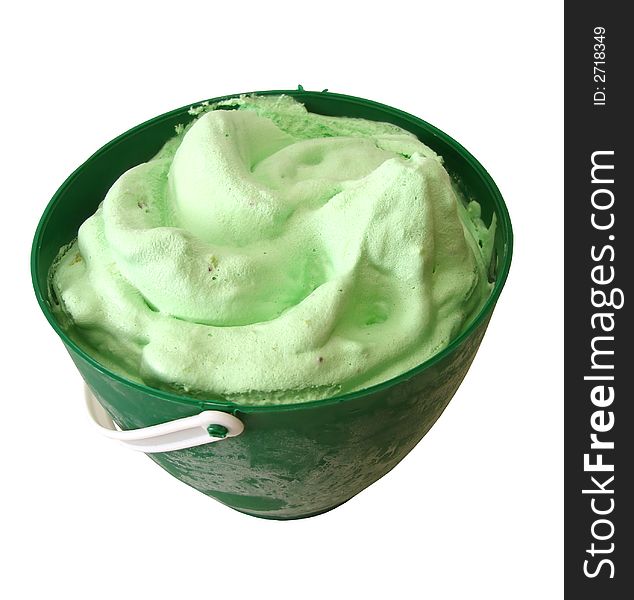 Green kiwi ice-cream in basket on white background