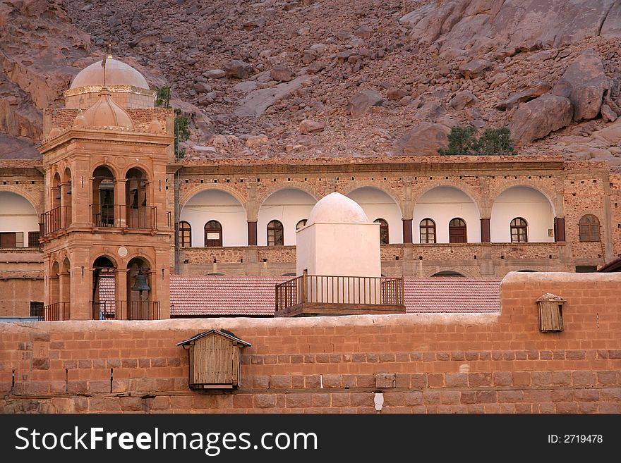 Bell-tower of orthodox church and minaret of mosque in the monastery of Saint Catherine, Sinai, Egypt. Bell-tower of orthodox church and minaret of mosque in the monastery of Saint Catherine, Sinai, Egypt