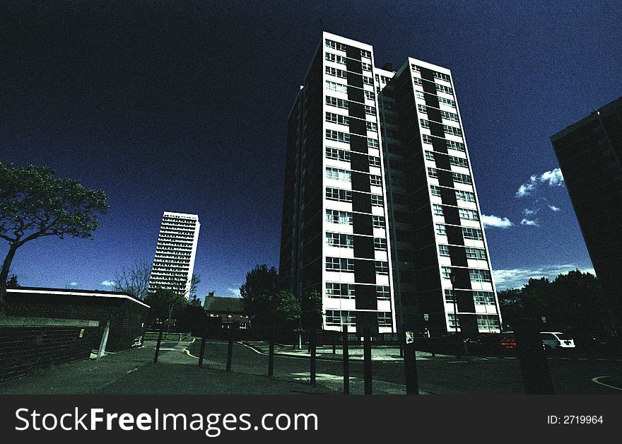 Polarized shot of urban hi rise housing. Film grain visible. Polarized shot of urban hi rise housing. Film grain visible