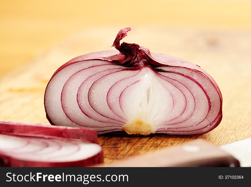 Red onion, sliced in half. Red onion, sliced in half